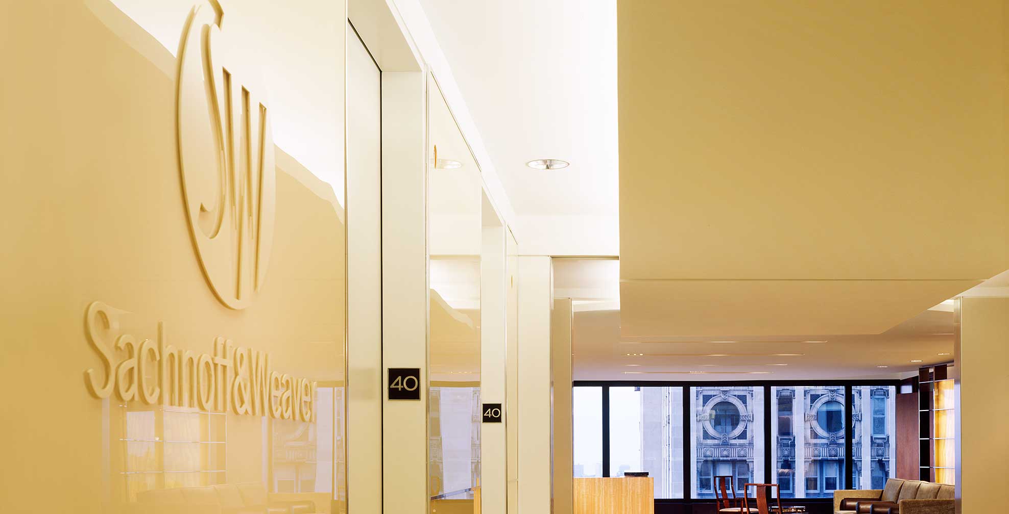 sachnoff-and-weaver_lobby-sign.jpg Art Direction by: Bart Crosby, Crosby Associates